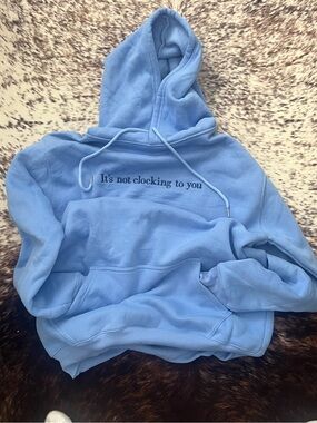 Light Blue Graphic Hoodie - "It's not clocking to you"